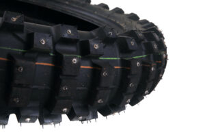 Dubbat bakdäck till Zero FX - Dunlop Sports D952 120/90-18 Begagnat men knappt inkört dubbat vinterdäck som passar till Zero FX bak.